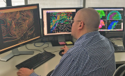  PHOTO - Weather Prediction Center Meteorologist Andrew Orrison uses weather model data 